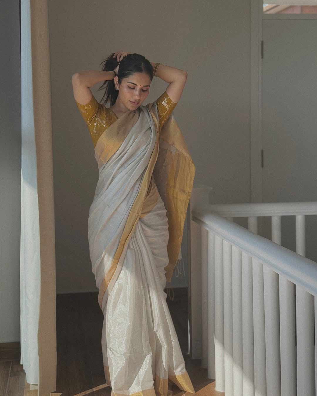 Ruhani Sharma Shines Bright In Simple White And Golden Saree