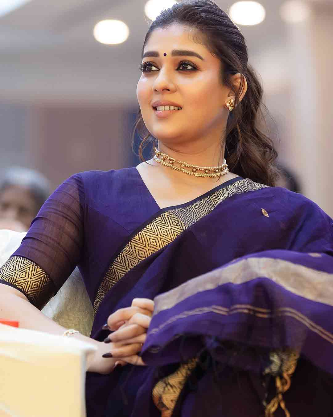Lady Superstar Nayanthara Wows in Purple Saree While Posing with Fans