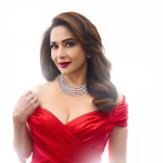 Spot light’s on: Madhuri Dixit strikes a pose in elegant RED!