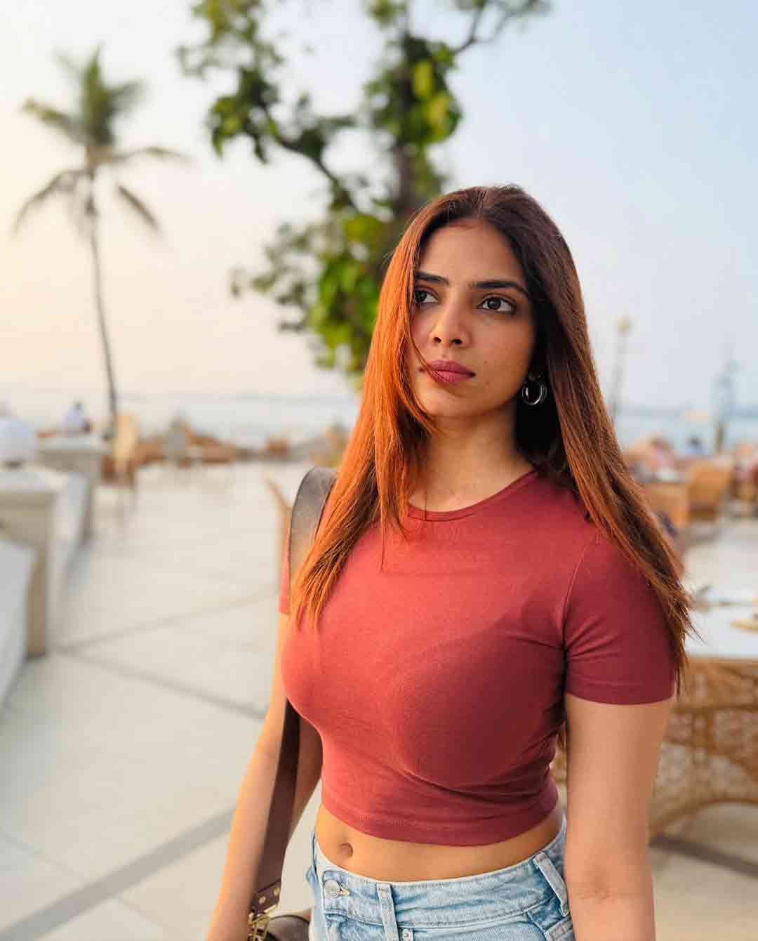 Island Glow: Malavika Mohanan Natural Beauty Steals the Spotlight