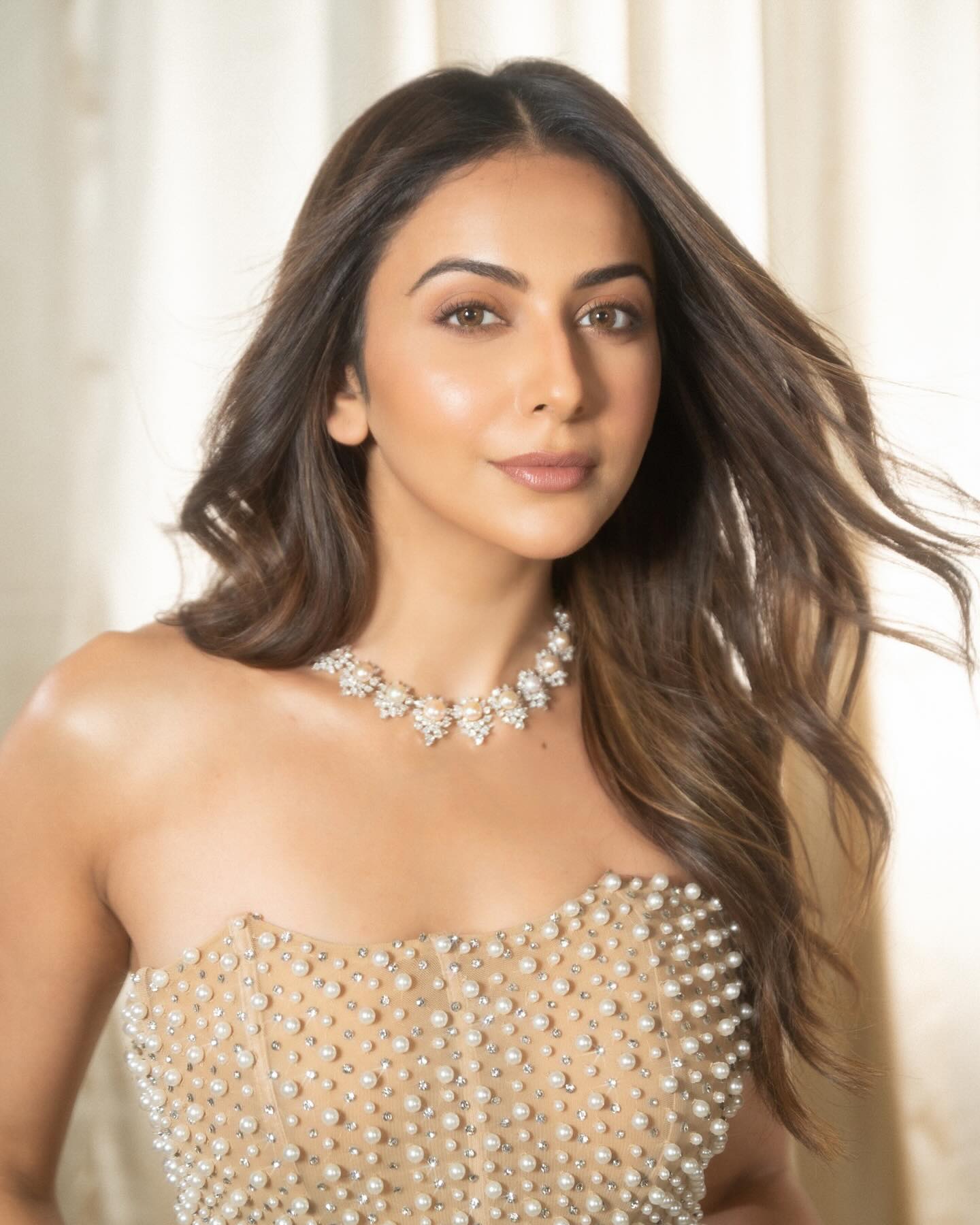 Rakul Preet Singh Stuns In Beige Pearl Bodycon Look