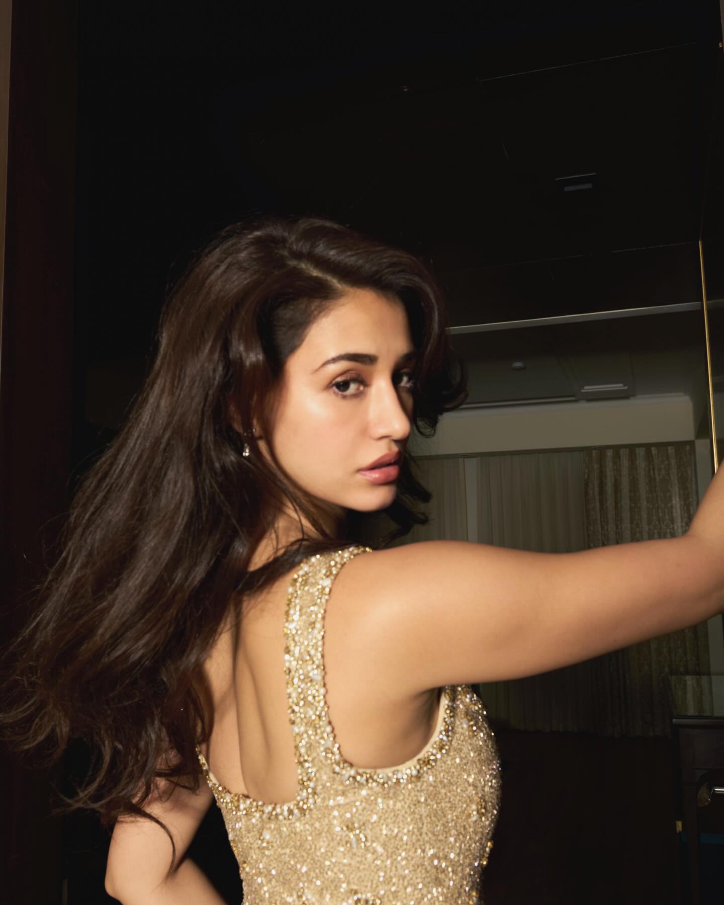 Disha Patani Shines Bright with Her Golden Glow Style
