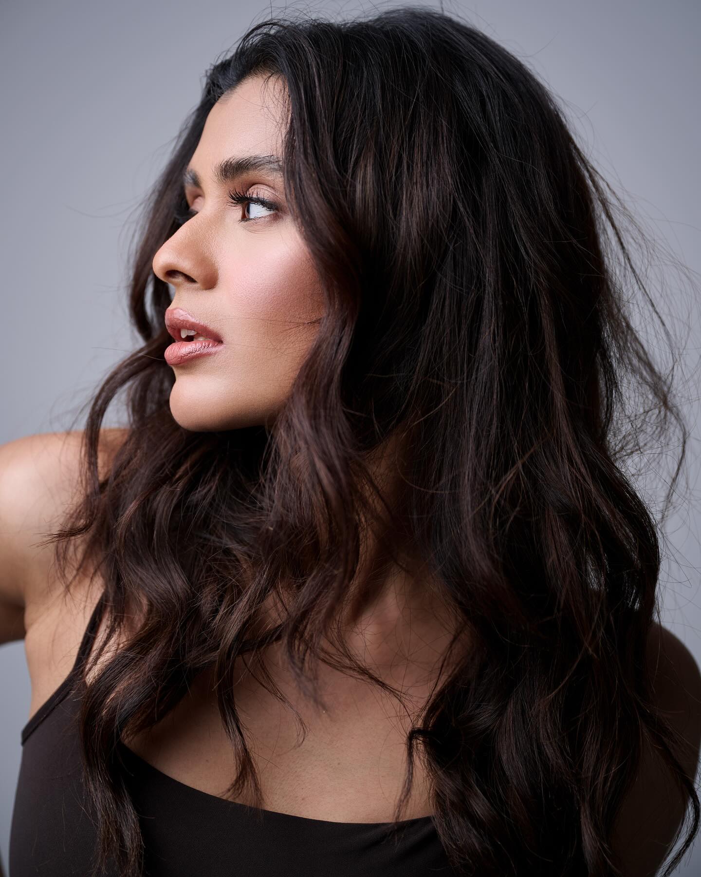 Hebah Patel Turns Heads in Black Ahead of Kumari 21F Re-Release