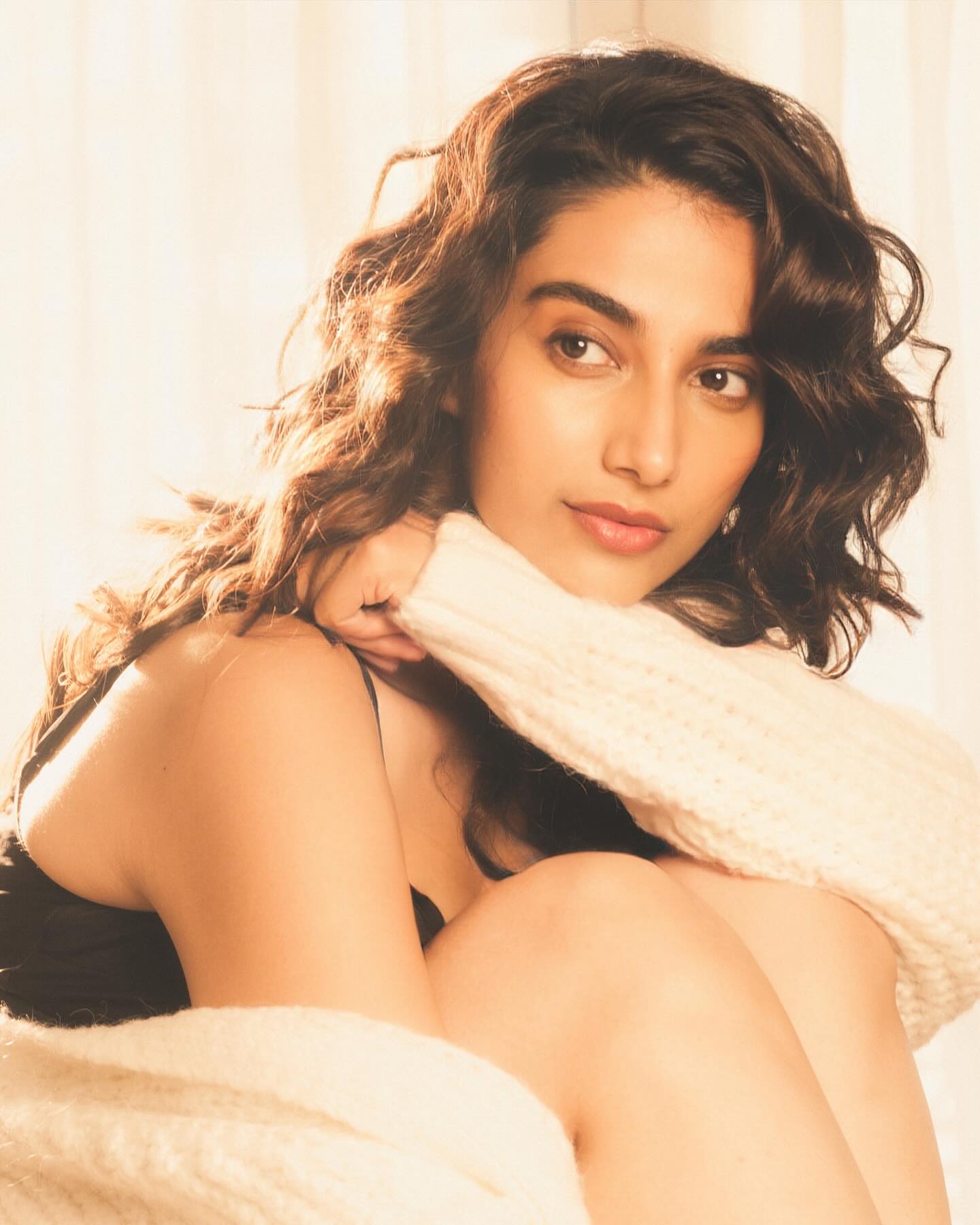 Meenakshi Choudhary Serves Glamour Goals in Sleek Black Mini Dress