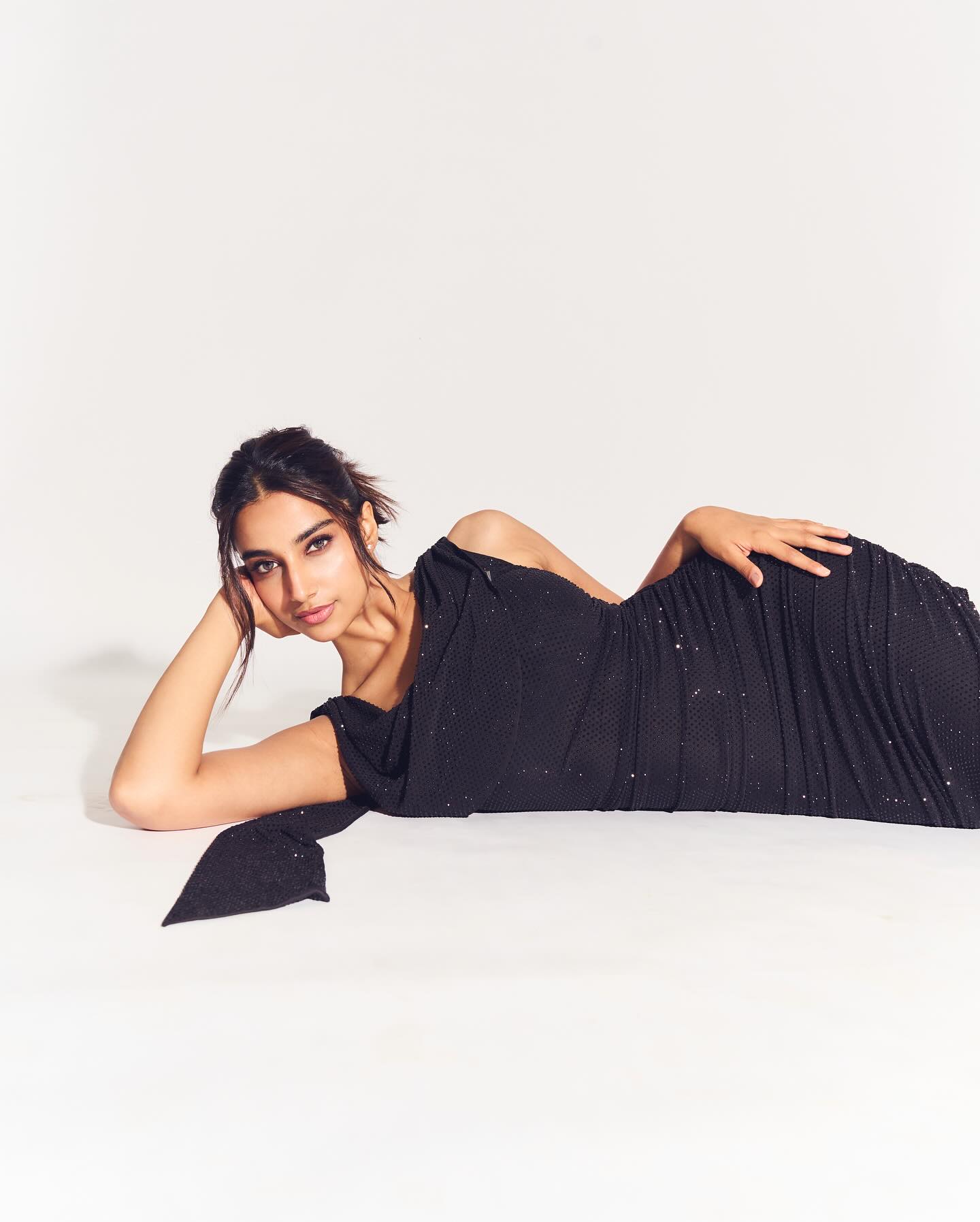 Meenakshi Chaudhary Turns Up Heat in Stunning Black Mini Dress