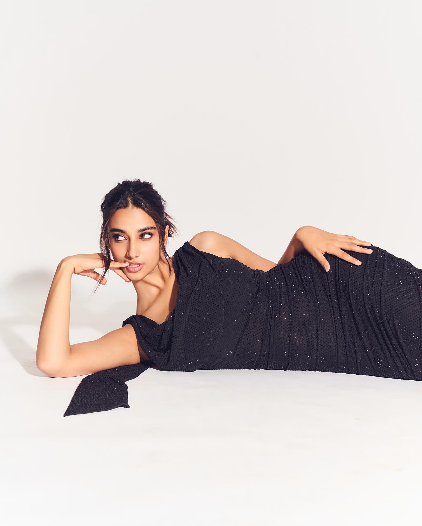 Meenakshi Chaudhary Turns Up Heat in Stunning Black Mini Dress