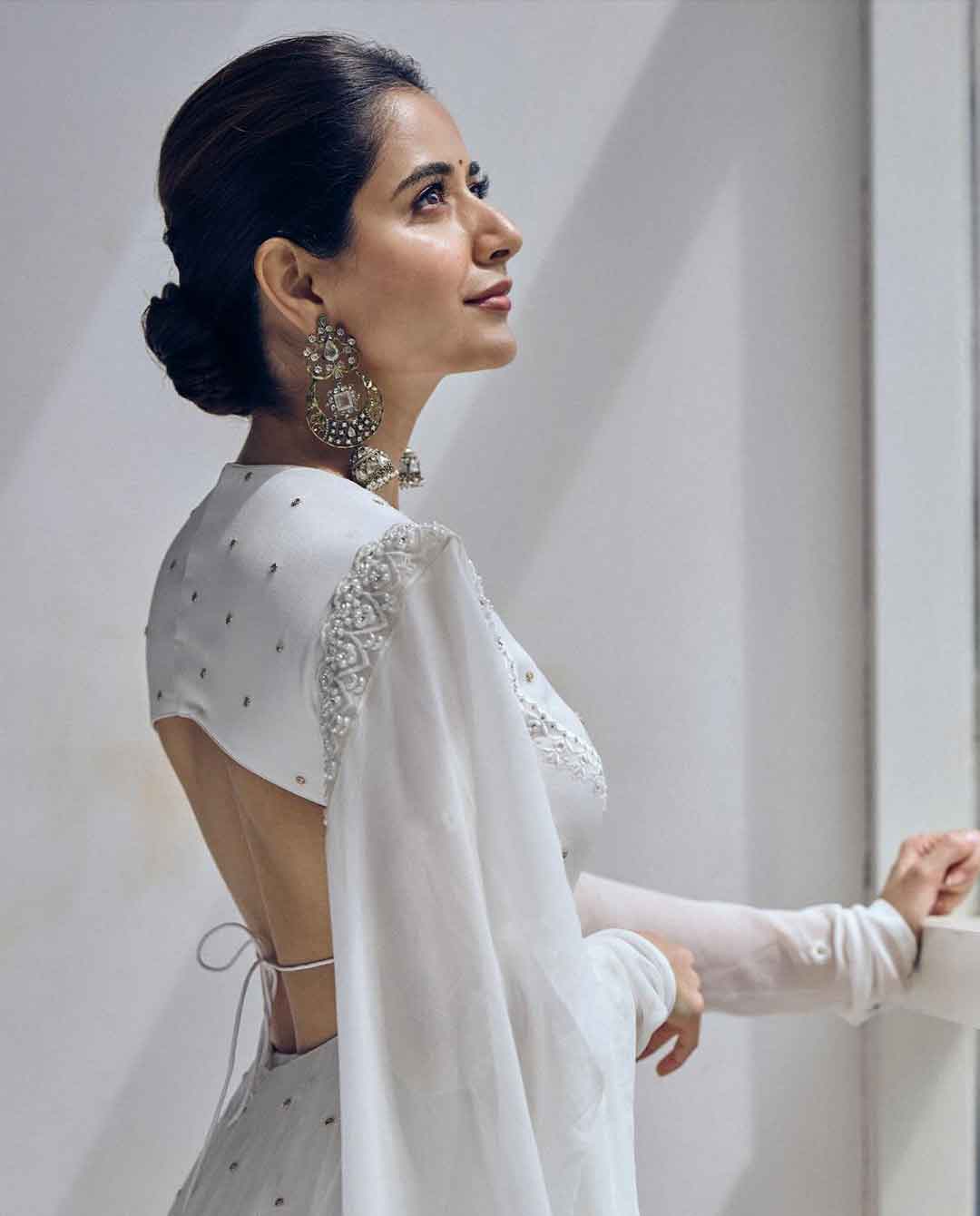 Ashika Ranganath Dazzles in White: Her Backless Look Is Pure Grace