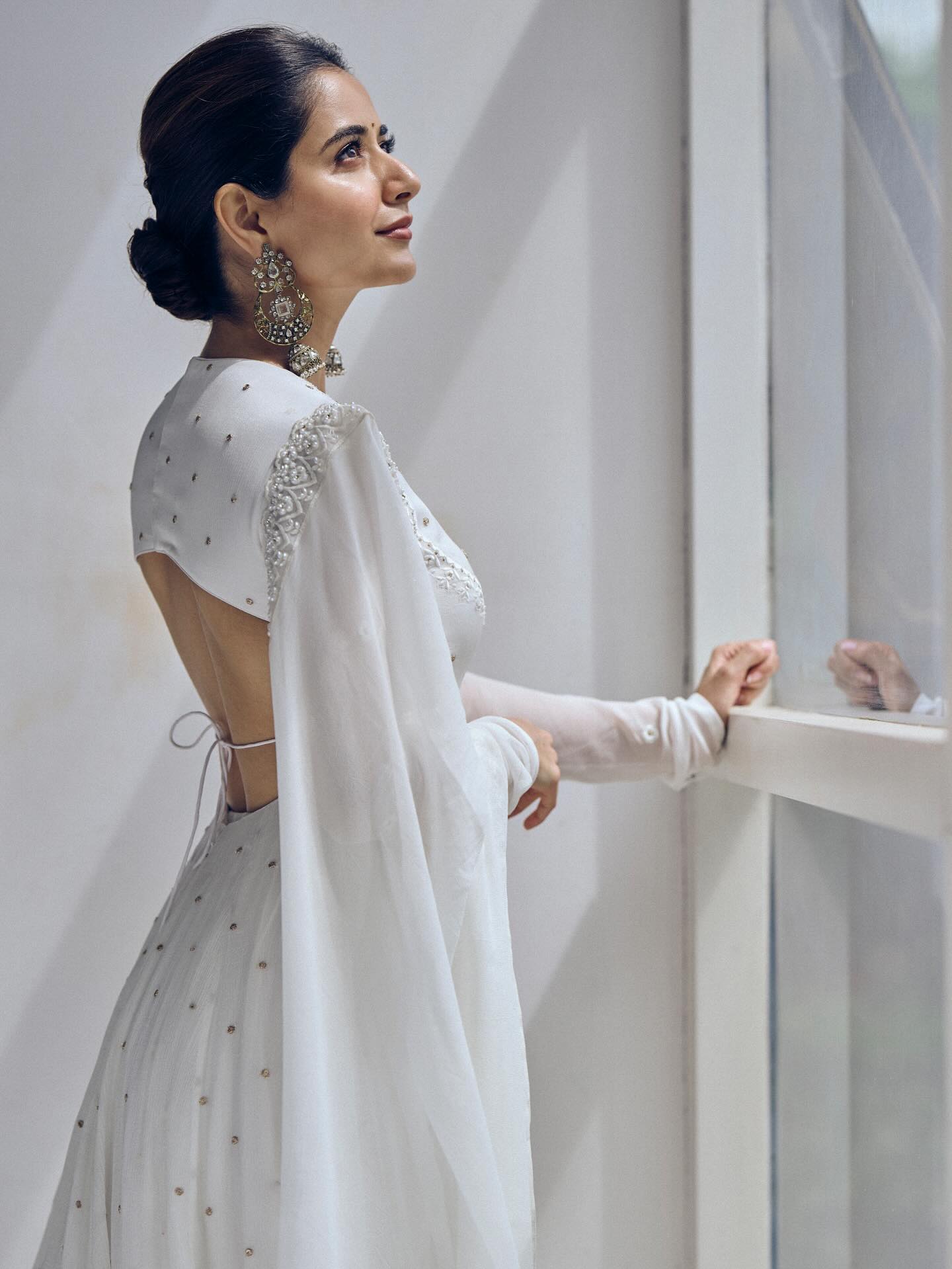 Ashika Ranganath Dazzles in White: Her Backless Look Is Pure Grace