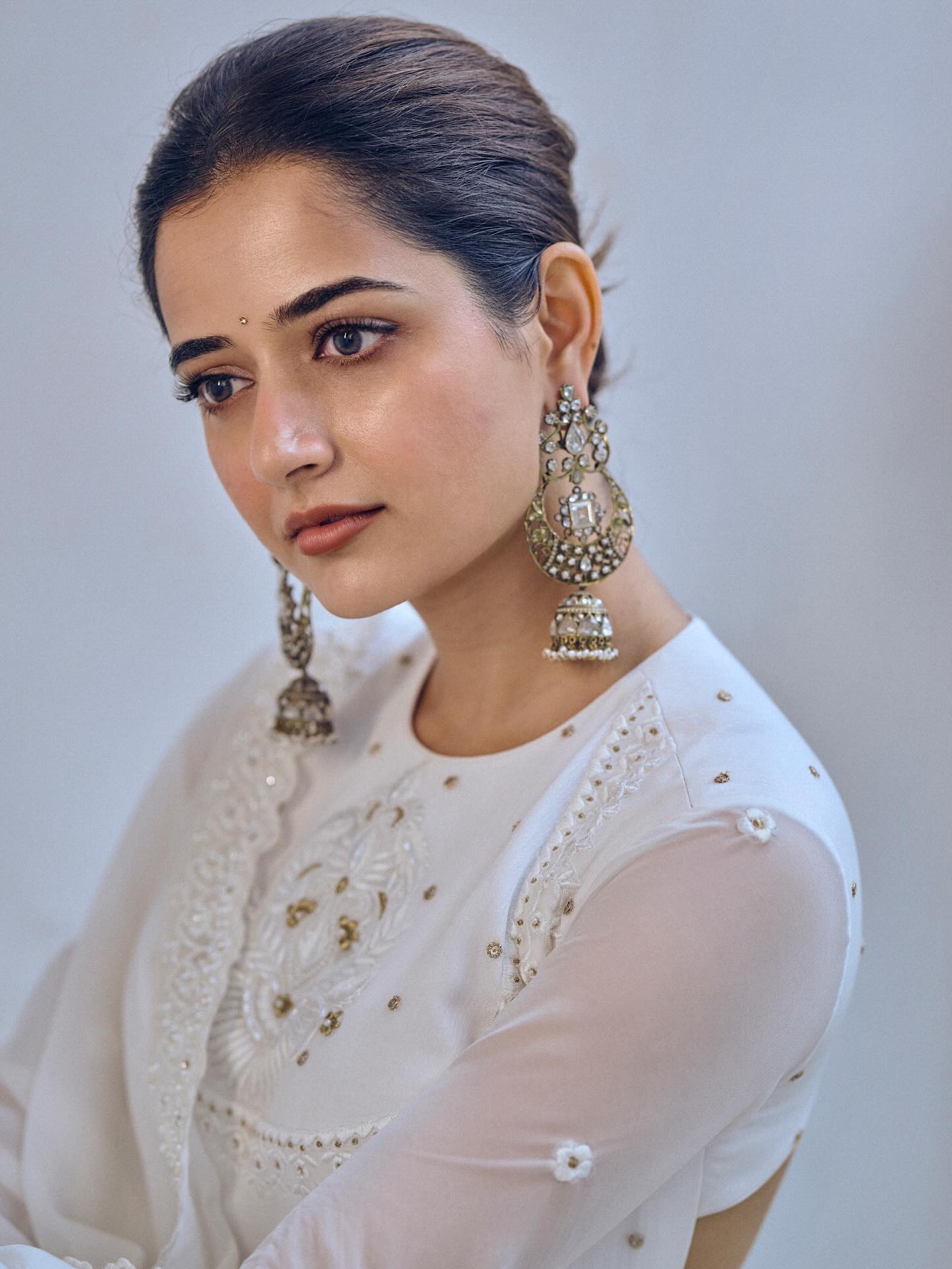 Ashika Ranganath Dazzles in White: Her Backless Look Is Pure Grace